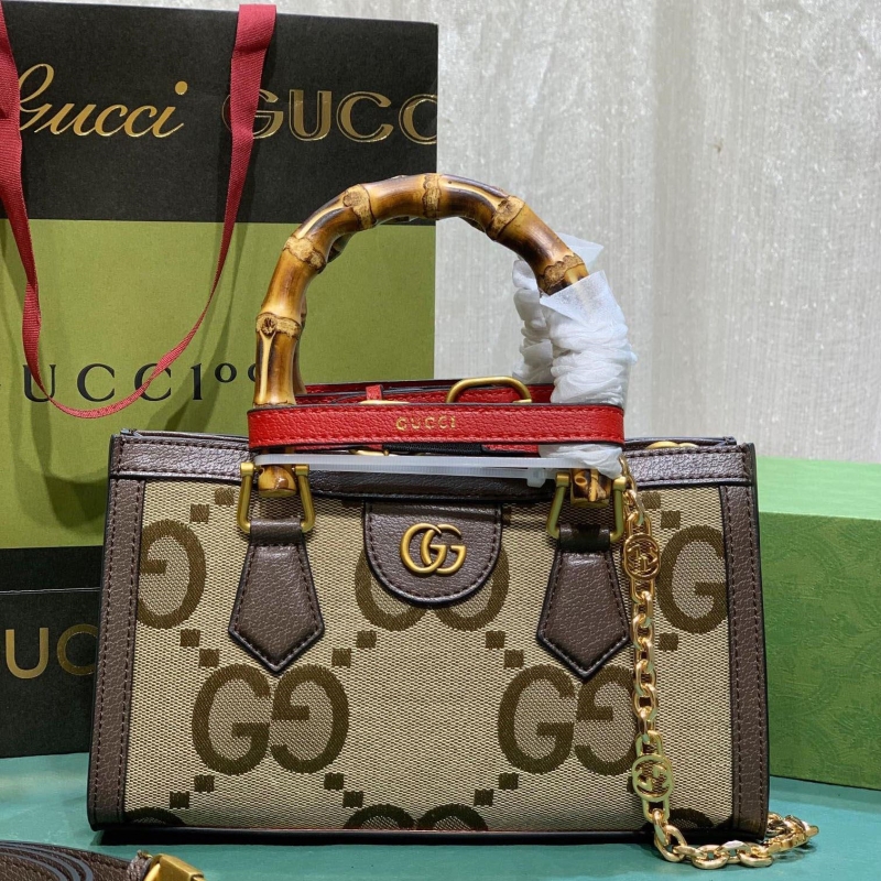 G*u*i top handle bags